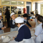 Students displaying culinary skills