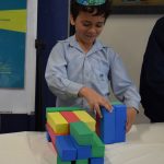 Student enjoying building blocks activity