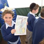 Student displaying her Sukkot colouring