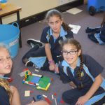 Students planning their lego sukkah