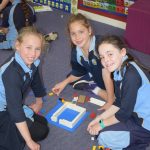 Students designing their lego sukkah