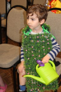 Student dressed as a gardener at PURIM celebration