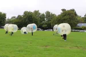 Students participating in bubble soccer